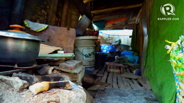 NO BATHROOM. An old woman lives in this small home with her family. The small space serves as their kitchen and bedroom, but they have no more room for a toilet. Photo by Fritzie Rodriguez/Rappler.com