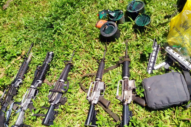 RECOVERED. The military recovered five M-16 rifles, two M-203 grenade launchers and improvised explosive devices from the NPA operatives after the encounter at Brgy. Upper Calmayong, Juban, Sorsogon on July 4, 2013. Photo from PAO-AFP