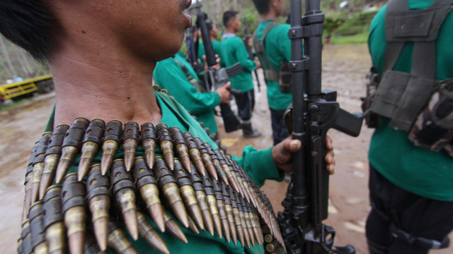 SHOW OF FORCE. New People's Army rebels in Compostela Valley. File photo by Karlos Manlupig