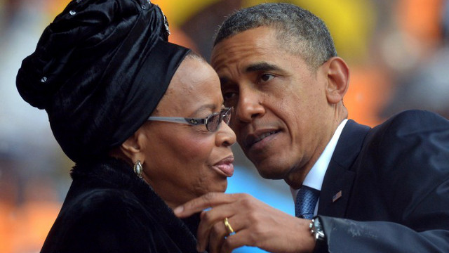 EULOGY. US President Barack Obama talks with the widow of former South African President Nelson Mandela, Graca Machel, during the memorial service for the late former president. Photo from Agence France-Presse