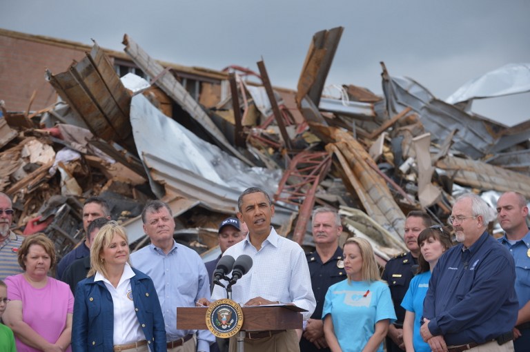 'WE'VE GOT YOUR BACK.' US President Barack Obama speaks following a tour of the tornado affected Plaza Towers Elementary School on May 26, 2013 in Moore, Oklahoma. Photo by Mandel Ngan/AFP