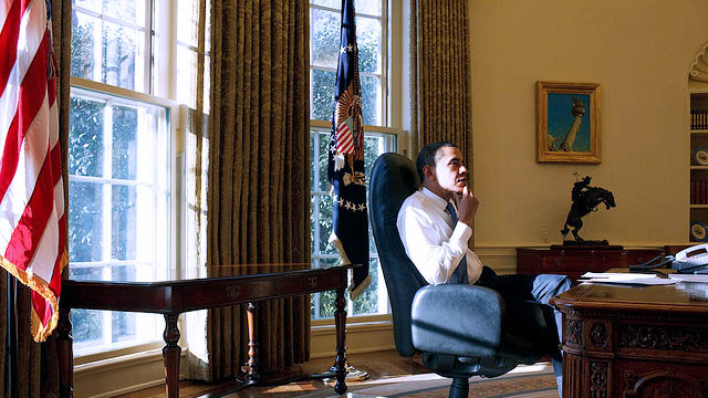 President Barack Obama sits in the Oval Office on his first day in office, back in Jan. 21, 2009. (Official White House Photo by Pete Souza)