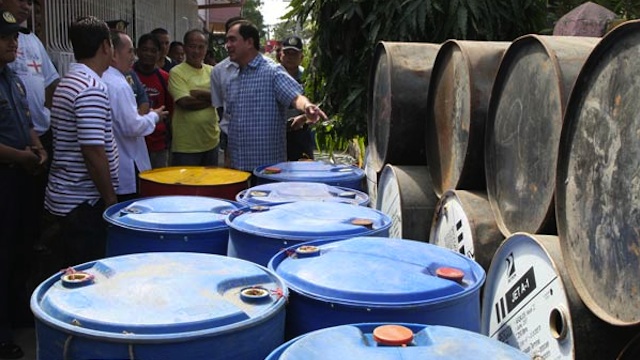 OIL SMUGGLING ON THE RISE. Local officials seize a cargo of smuggled oil products in San Fernando, La Union. Photo courtesy of www.sanfernandocity.gov.ph