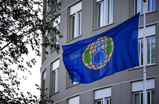 NOBEL WINNER. A file picture dated 31 August 2013 shows the flag of the Organization for the Prohibition of Chemical Weapons (OPCW) in front of their building in The Hague, The Netherlands. EPA/Guus Schonewille