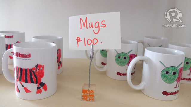 WHIMSICAL MUGS. The design on the mugs are prints of drawings by the students