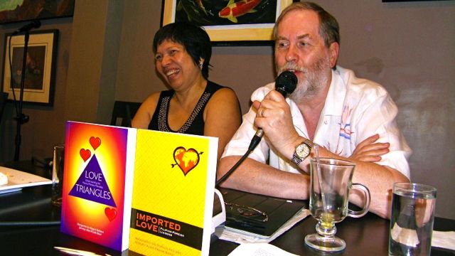 DR. HOLMES AND MR. BAER with their latest books 'Love Triangles' and 'Imported Love.' Photo by Ime Morales