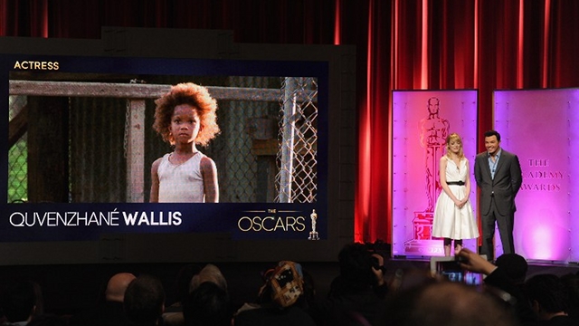 YOUNG NOMINEE. Emma Stone and Seth MacFarlane announce 9 year old Quvenzhane Wallis as a nominee for Best Actress at the 85th Academy Awards Nominations Announcement at the AMPAS Samuel Goldwyn Theater on January 10, 2013 in Beverly Hills, California.Wallis is the youngest best actress nominee in the history of the Academy Awards. Kevin Winter/Getty Images/AFP