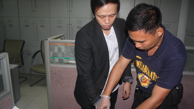 INDICTED. Cabrera is fingerprinted before being booked for the crime at the Makati police station after his arrest. Photo courtesy of Makati police