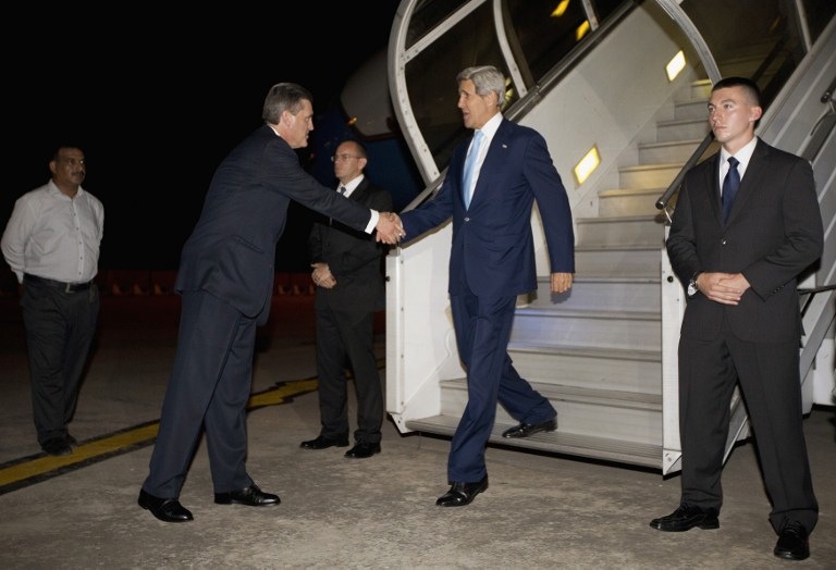 KERRY IN PAKISTAN. US Secretary of State John Kerry(R) is greeted by US Ambassador to Pakistan Richard Olson (2nd L) upon his arrival in Islamabad, Pakistan, July 31, 2013. Photo by AFP/Pool/Jason Reed