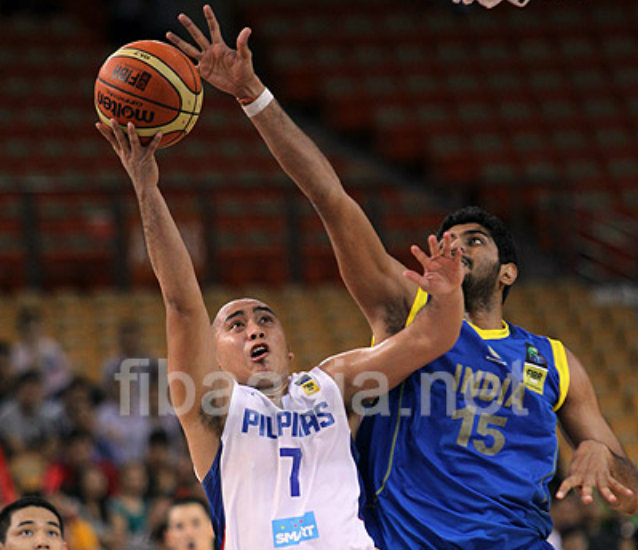 Paul Lee of Gilas Pilipinas goes to the rim against Indian center Rikin Shantilal Pethani during the FIBA Asia Cup. Photo from FIBA Asia