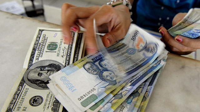 ARRESTED APPRECIATION. Authorities may "carry out strong measures" to stall the appreciation of the peso. Photo by AFP