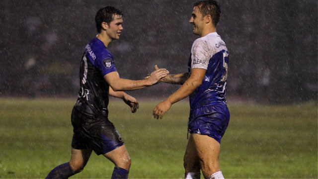 PAST AND PRESENT. Phil and Cannavaro trade pleasantries during the rain-soaked match. Photo by Rappler/Josh Albelda.
