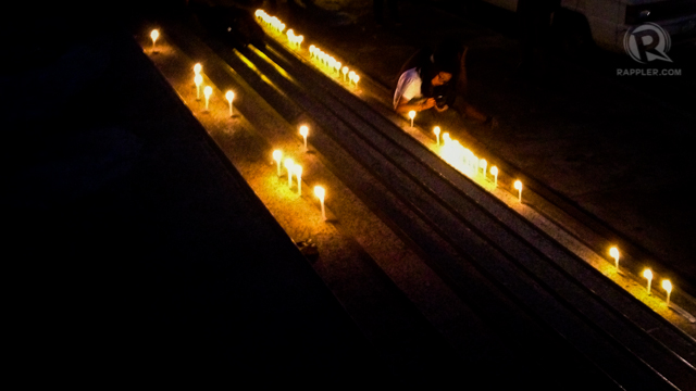 VIGIL. UP students hold a simple memorial for fellow-student, Lorena. Photo by Paige Occeñola