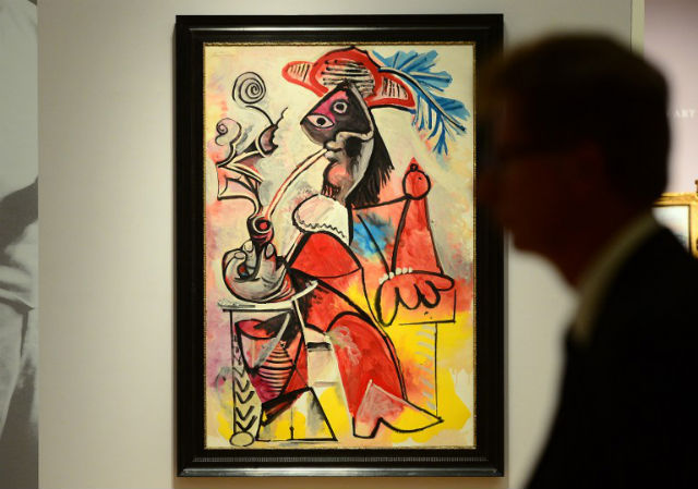 AT $31 MILLION. "Mousquetaire a la pipe" by artist Pablo Picasso is on display during a press preview of Sotheby's auction of impressionist and modern art. AFP Photo