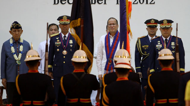 CHANGE OF LEADERSHIP. President Benigno S. Aquino III looks on the entry of colors during the Philippine National Police (PNP) Change of Command Ceremony with incoming chief Alan Purisima and outgoing head Nicanor Bartolome. Photo by Malacanang Photo Bureau.
