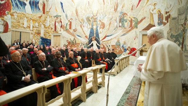 ROMAN CURIA. This handout photograph provided by Osservatore Romano shows Pope Benedict XVI addressing cardinals and prelates of Roman curia during a meeting, the day of the closing of the Spiritual Exercises at the Vatican on February 23, 2013. AFP Photo/Osservatore Romano