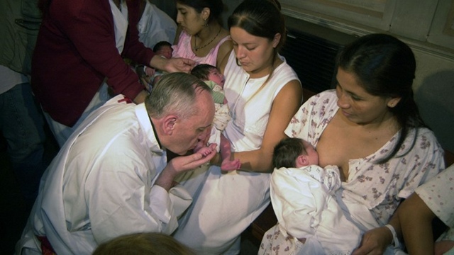 CHAMPION OF POOR. Then Cardinal Bergoglio performs the footh bath ceremony in Buenos Aires, on March 24, 2005. Photo from AFP