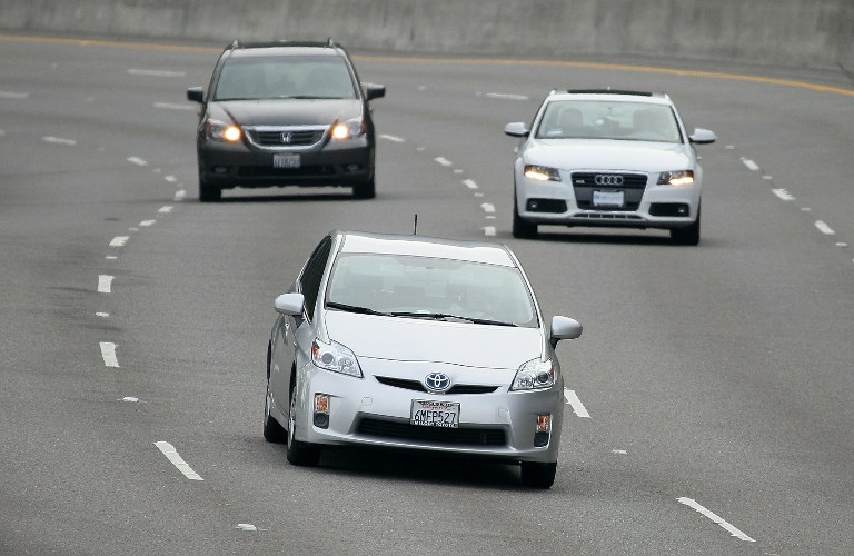 RECALL. A Toyota Prius (C) drives along highway 101 on November 30, 2010 in Sausalito, California. Photo by Justin Sullivan/Getty Images/AFP