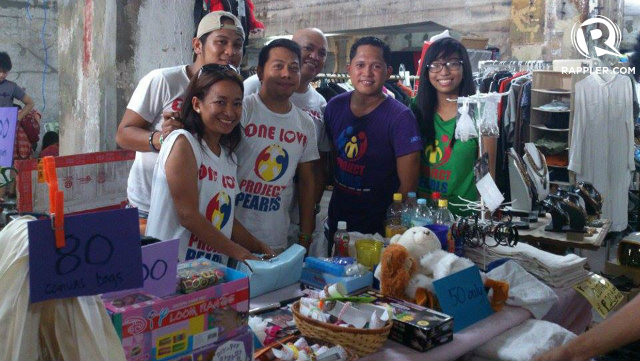 PROJECT PEARLS. Fourth from left is Juan Villa, he leads the weekly feeding program in Ulingan, Tondo. Photo by Francine Curio