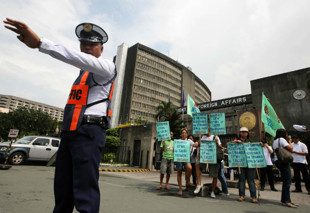 PROTESTS VS GOV'T. Outside the DFA on Nov 4, 2013, protesters urge the Philippine government to repatriate stranded, undocumented Filipino workers in Saudi Arabia amid a Saudi government crackdown against foreigners working without permits. Photo by EPA/Francis Malasig