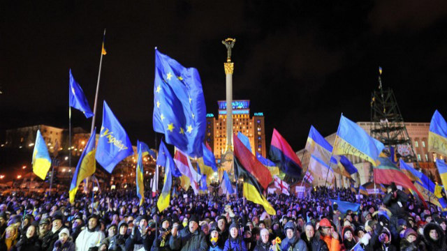 MASSIVE RALLY. People shout slogans and wave Ukrainian and European Union flags during an opposition rally at Independence Square in Kiev on December 2, 2013. File photo by Genya Savilov/AFP