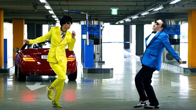 PSY (right) IN A SCENE from the 'Gangnam Style' music video. Image from Psy's Facebook page