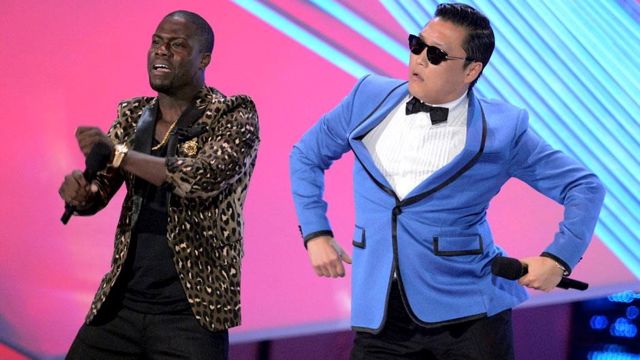 PSY DANCES GANGNAM-STYLE with Kevin Hart at the MTV Video Music Awards 2012. Image from Psy's Facebook page, taken by Getty Images and published at MTV.com