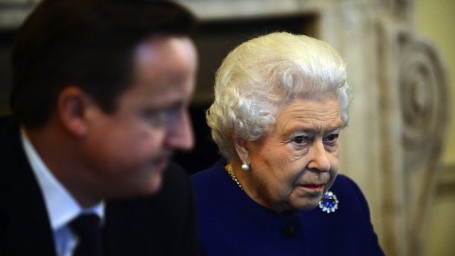 HER MAJESTY. Britain's Queen Elizabeth II (R) listens next to British Prime Minister David Cameron (L) during the Cabinet meeting inside No 10 Downing Street in central London December 18, 2012. Queen Elizabeth II attended a British Cabinet meeting on December 18. AFP PHOTO / POOL / JEREMY SELWYN