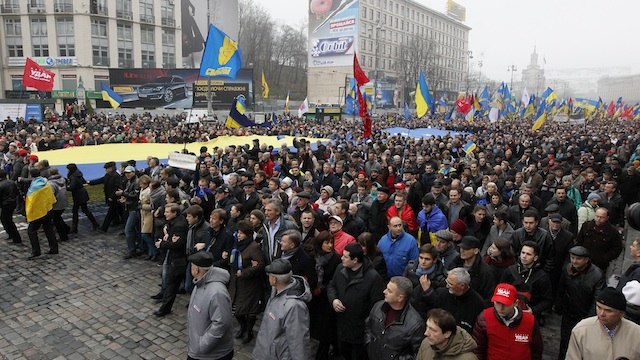PRO-EU RALLY. Ukrainians march during an anti-government mass protest in downtown Kiev, Ukraine, 24 November 2013. EPA/Sergey Dolzhenko