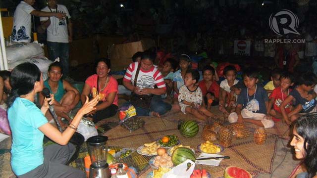 HELPING COMMUNITIES. Raw food relief work for tropical storm Sendong victims in Cagayan de Oro. Photo from Raw Food Pinoy