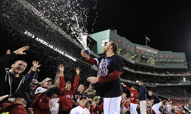 VICTORY SPLASH. Boston Red Sox pitcher Ryan Demptster sprays beer on fans after the Red Sox defeated the Detroit Tigers at Fenway Park in Boston, Massachusetts, USA, 19 October 2013. EPA/Rhona Wise