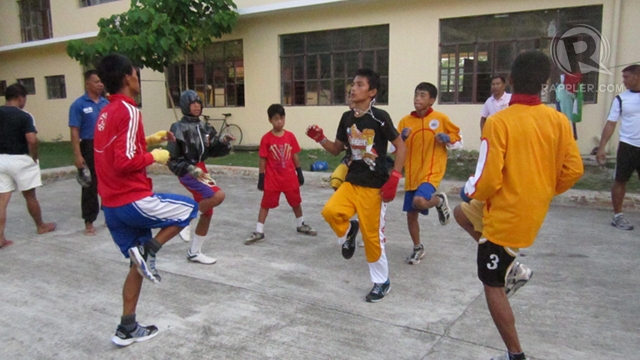 PRACTICE MAKES PERFECT. Region 1 athletes training in the Pangasinan National High School, their billeting station. Isabel Rodriguez,