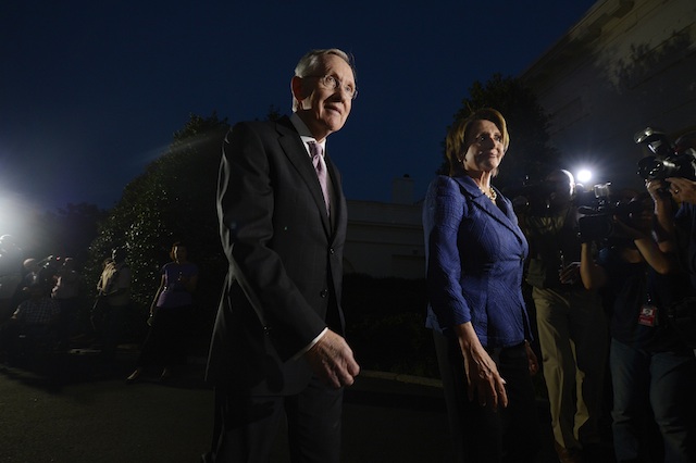 DEMOCRATS UNITED. US Senate Majority Leader, Democrat Harry Reid (L), and US House Minority Leader, Democrat Nancy Pelosi (R), following a meeting with US President Barack Obama (not pictured) on the partial government shutdown standstill, outside the Oval Office of the White House in Washington DC, USA, 02 October 2013. EPA/Michael Reynolds