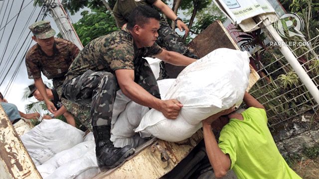 HOARDING? The government will probe reports of local officials hoarding relief goods for quake victims in Bohol. Photo by Rappler