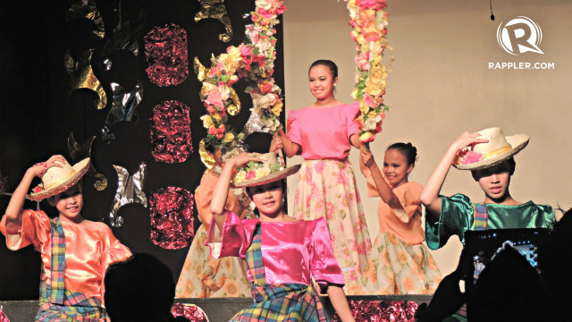 SMILES AND HUES. Donning their attractive costumes, a group of girls performed a Filipino folk dance with grace and pride as Filipinas during Xavier Ecoville’s show, “Straight from the Art.” All photos by Lea P. Cid 