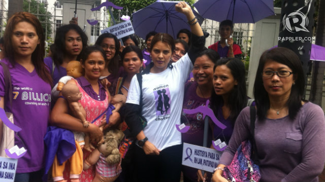WOMEN'S RIGHTS. The author raises a clenched fist in solidarity with the pro-RH advocates outside the Supreme Court. All photos contributed by Giselle Tongi-Walters