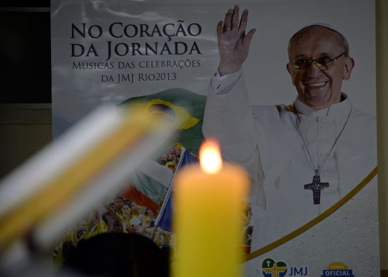 READY FOR POPE FRANCIS. Scene in a church at a shantytown in Rio de Janeiro, Brazil, on July 14, 2013, where Pope Francis is due to celebrate mass during his upcoming visit next July 22 to 28. AFP PHOTO / Vanderlei Almeida