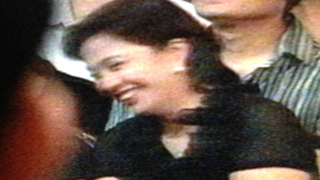 LIGHT MOMENTS. The late Jesse Robredo's wife, Leni, laughs while the Cabinet performs. Screen grab from Malacañang feed