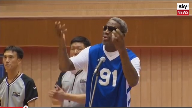 HAPPY BIRTHDAY, MR DICTATOR. Former NBA star Dennis Rodman sings "Happy Birthday" to North Korean leader Kim Jong-un (not in photo) before the start of an exhibition game in Pyongyang, 8 January 2014. Frame grab from video by Sky News
