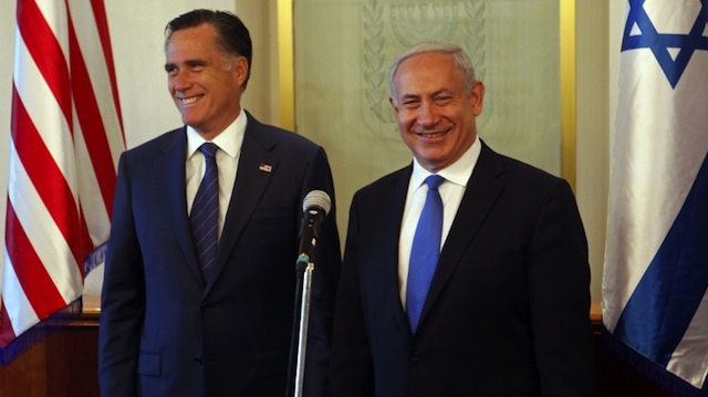 PAYBACK? Defeated US Republican presidential hopeful Mitt Romney shares a laugh with Israeli Prime Minister Benjamin Netanyahu (R) before a meeting at the premier's office in Jerusalem on July 29, 2012. AFP PHOTO/POOL/LIOR MIZRAHI