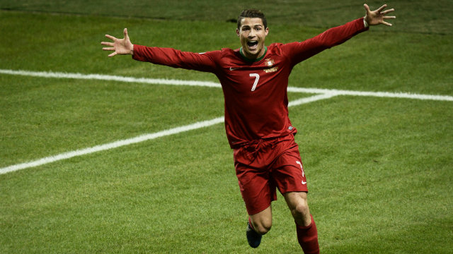 GOAL REACHED. Portugal's Cristiano Ronaldo celebrating after scoring the 2-3 goal during the FIFA World Cup 2014 qualifying playoff second leg soccer match between Sweden and Portugal at Friends Arena in Solna, Sweden. Ronaldo has been voted FIFA Men's World Player of the Year 2013 during the FIFA Ballon d'Or 2013 gala at the Kongresshaus in Zurich, Switzerland. Photo by Pontus Lundahl/EPA