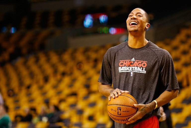 RETURNING TO THE COURT. In this file photo, Derrick Rose #1 of the Chicago Bulls laughs while warming up prior to the game against the Boston Celtics on January 16, 2013 at TD Garden in Boston, Massachusetts. Jared Wickerham/Getty Images/AFP