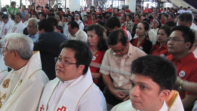 PRO-LIFE. Anti-Reproductive Health Bill advocates hear mass at St Peter's Parish in Quezon City. Photo by Angela Casauay