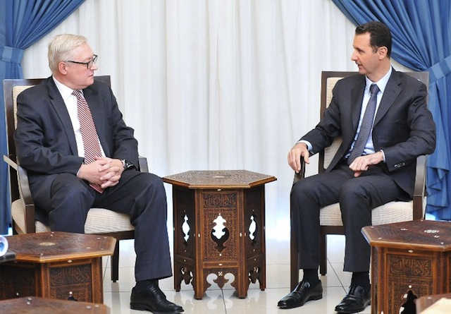 DAMASCUS MEETING. A handout picture released by the official Syrian Arab News Agency (SANA) on September 18, 2013 shows Russian Deputy Foreign Minister Sergei Ryabkov (L) meeting with Syrian President Bashar al-Assad in the capital Damascus. AFP/SANA/Handout