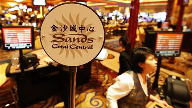 A logo of Sands Cotai Central is seen on a gaming table inside a casino on the opening day of the Sands Cotai Central, Sands' newest integrated resort in Macau April 11, 2012. Credit: Reuters/Tyrone Siu