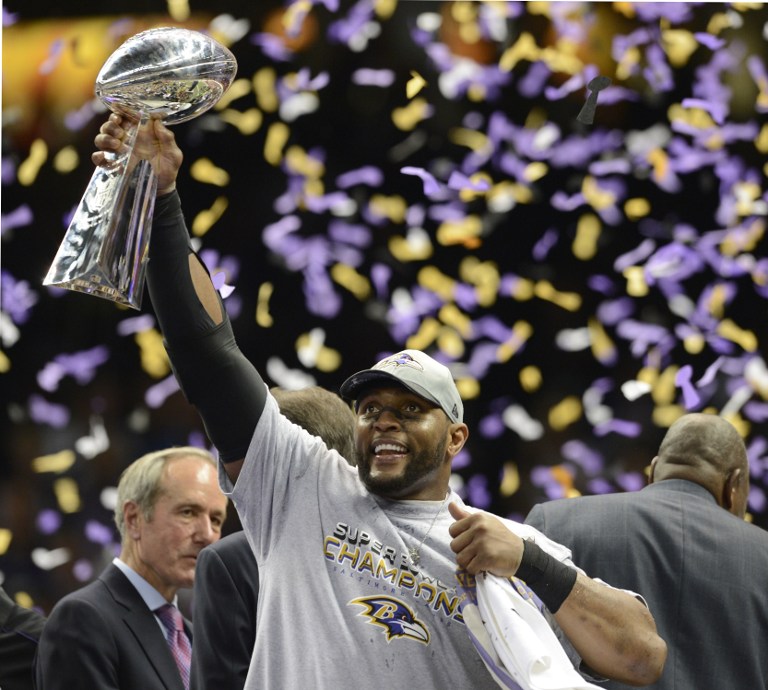 Ray Lewis of the Baltimore Ravens holds aloft the Vince Lombardi Trophy following their 34-31 victory over the San Francisco 49ers in Super Bowl XLVII at the Mercedes-Benz Superdome on February 3, 2013 in New Orleans, Louisiana. AFP PHOTO / TIMOTHY A. CLARY