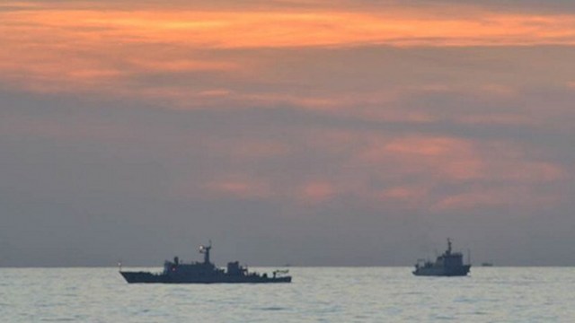 HISTORIC CASE. The Philippines is set to file its written pleading against China on March 30. File 2012 photo of Chinese surveillance ships off Scarborough Shoal by DFA/Philippine Navy/AFP 