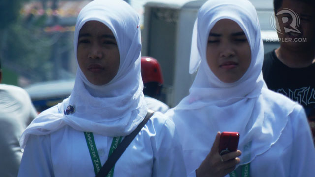 RELIGIOUS FREEDOM. Muslim women on the streets of Zamboanga City. Photo by Amir Mawallil