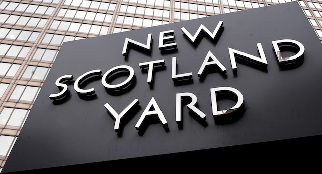 The sign of New Scotland Yard is seen in central London, Britain, 03 April 2013. Photo by EPA/Andy Rain