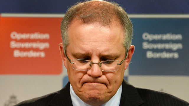APOLOGIES. Australian Immigration Minister Scott Morrison at a press conference in Sydney on September 30, 2013. Photo by William West/AFP